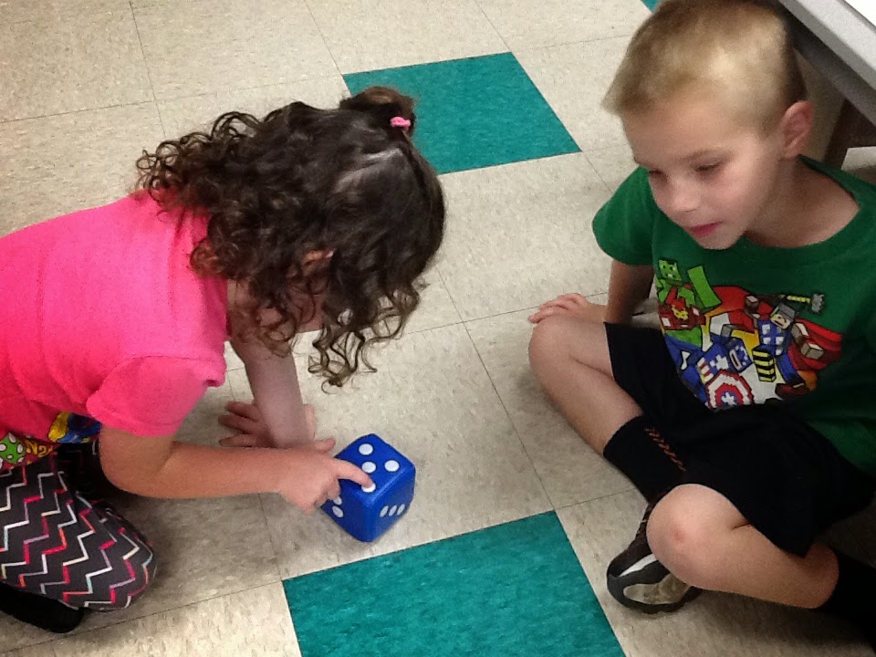 Amazing Math Skills with Dice Kiddos counting number 5 on dice Teach Magically